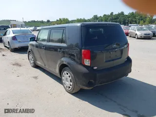 2011 Scion xB with VIN JTLZE4FE9B1118729, listed as a IAAI auction lot 40312454 with 129,260 mi miles. Bid and sale history available at carsss.com. Image 3.
