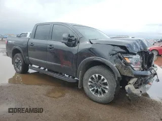 2024 Nissan Titan Pro-4X with VIN 1N6AA1ED7RN106896, listed as a Copart auction lot 55622215 with 16,155 mi miles and Salvage title. Bid and sale history available at DreamBid. Image 4.