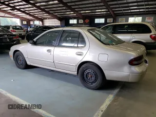 1996 Nissan Altima XE z VIN 1N4BU31D0TC137724, wystawiony jako Copart lot #71544394 z przebiegiem 122 704 mil mil oraz Czysty tytuł • Clean title. Historia ofert i sprzedaży dostępna na DreamBid. Obrazek 2.