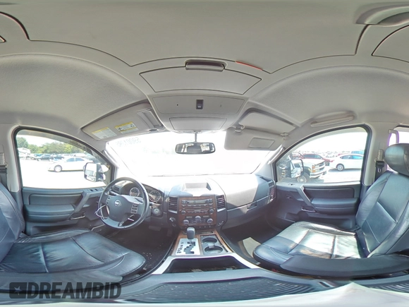 2011 Nissan Titan SL with VIN 1N6AA0EC4BN305296, listed as a Copart auction lot 59001395 with 194,557 mi miles and Salvage title. Bid and sale history available at DreamBid. Image 14.