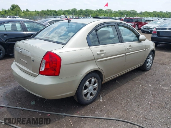 2006 Hyundai Accent GLS with VIN KMHCN46C26U037605, listed as a IAAI auction lot 42431996 with 86,128 mi miles and . Bid and sale history available at DreamBid. Image 4.