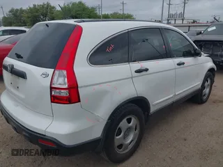 2007 Honda CR-V LX with VIN JHLRE38387C032957, listed as a IAAI auction lot 41936546 with 144,688 mi miles. Bid and sale history available at carsss.com. Image 4.