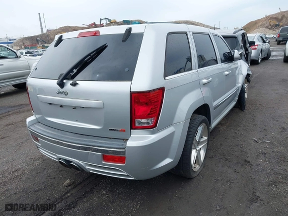 2007 Jeep Grand Cherokee SRT-8 with VIN 1J8HR78367C649237, listed as a IAAI auction lot 42019555 with 101,967 mi miles. Bid and sale history available at carsss.com. Image 4.
