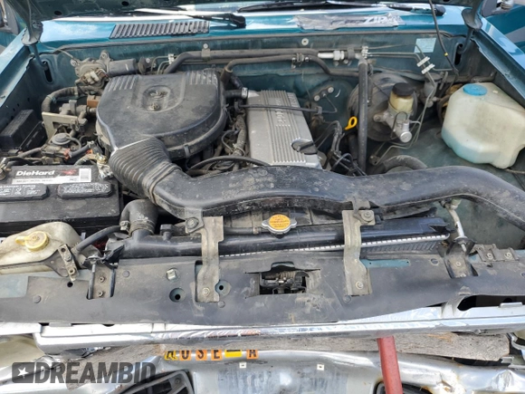 1997 Nissan Frontier XE with VIN 1N6SD11SXVC332100, listed as a Copart auction lot 54330245 with 203,959 mi miles and Salvage title. Bid and sale history available at DreamBid. Image 11.