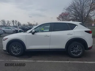 2017 Mazda CX-5 Touring with VIN JM3KFACL5H0189296, listed as a IAAI auction lot 42042328 with 60,208 mi miles and . Bid and sale history available at carsss.com. Image 14.