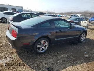 2007 Ford Mustang GT Deluxe with VIN 1ZVFT82H275246450, listed as a Copart auction lot 52744255 with 103,593 mi miles and Salvage Title. Bid and sale history available at carsss.com. Image 3.