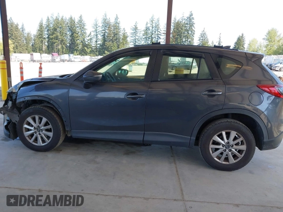 2016 Mazda CX-5 Sport with VIN JM3KE4BY1G0910102, listed as a IAAI auction lot 42115163 with 144,495 mi miles and . Bid and sale history available at carsss.com. Image 15.