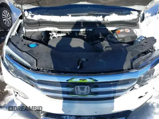 2017 Honda Pilot Touring with VIN 5FNYF6H98HB102313, listed as a IAAI auction lot 41244311 with 106,931 mi miles. Bid and sale history available at carsss.com. Image 10.