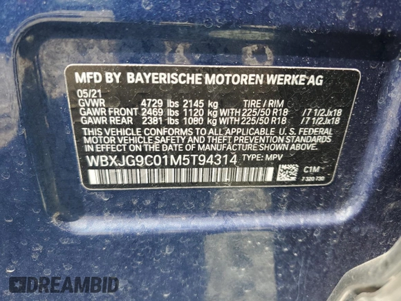 2021 BMW X1 xDrive28i with VIN WBXJG9C01M5T94314, listed as a Copart auction lot 60244134 with 43,933 mi miles and Salvage title. Bid and sale history available at DreamBid. Image 14.