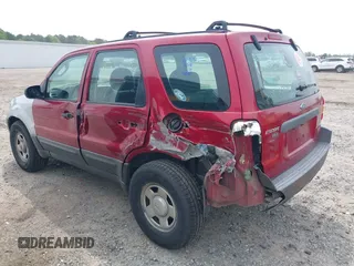 2003 Ford Escape XLS Popular with VIN 1FMYU02173KB35039, listed as a IAAI auction lot 42027491 with 208,808 mi miles and . Bid and sale history available at DreamBid. Image 3.