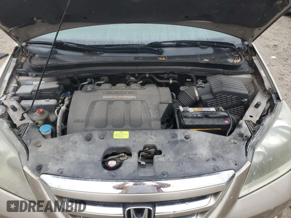 2007 Honda Odyssey EX-L with VIN 5FNRL38657B126262, listed as a Copart auction lot 80701484 with 101,020 mi miles and Non Repairable. Bid and sale history available at DreamBid. Image 12.