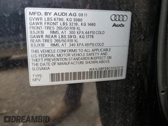 2012 Audi Q7 Premium Plus with VIN WA1LGBFE6CD002978, listed as a Copart auction lot 68976494 with 116,353 mi miles and Salvage title. Bid and sale history available at DreamBid. Image 14.