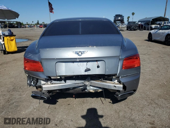 2014 Bentley Flying Spur с VIN SCBEC9ZA7EC090575, выставлен на аукционе Copart как лот 57110315 с пробегом 19 083 миль миль и Списание • Salvage title. История ставок и продаж доступна на DreamBid. Изображение 6.