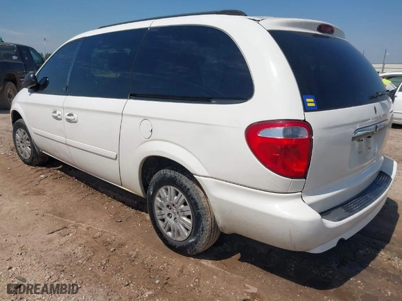 2006 Chrysler Town & Country LWB LX with VIN 2A4GP44RX6R799790, listed as a IAAI auction lot 41890709 with 151,443 mi miles. Bid and sale history available at carsss.com. Image 3.
