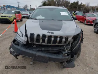 2016 Jeep Cherokee Trailhawk with VIN 1C4PJMBS7GW192574, listed as a IAAI auction lot 41986638 with 144,970 mi miles and . Bid and sale history available at DreamBid. Image 12.