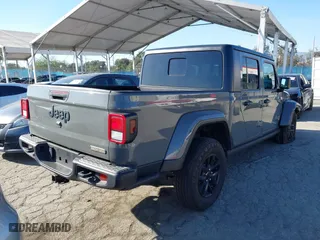 2023 Jeep Gladiator Freedom with VIN 1C6HJTAG9PL517097, listed as a IAAI auction lot 41860666 with 24,478 mi miles. Bid and sale history available at carsss.com. Image 4.