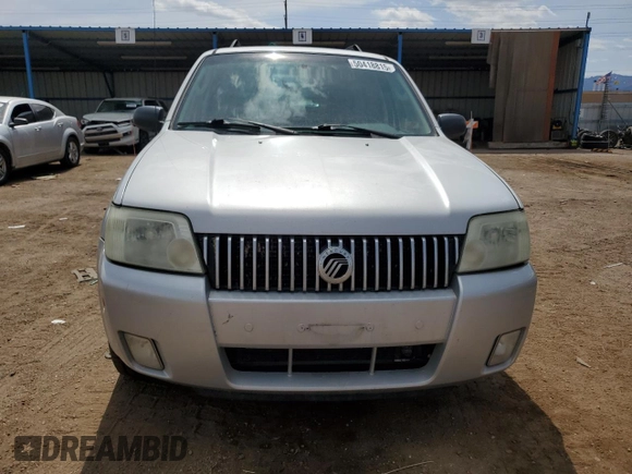 2007 Mercury Mariner Luxury z VIN 4M2YU91117KJ02032, wystawiony jako Copart lot #50418815 z przebiegiem 128 498 mil mil oraz Szkoda całkowita • Salvage title. Historia ofert i sprzedaży dostępna na DreamBid. Obrazek 5.