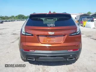 2019 Cadillac XT4 FWD Sport z VIN 1GYFZER4XKF103780, wystawiony jako IAAI lot #42171306 z przebiegiem 99 260 mil mil oraz . Historia ofert i sprzedaży dostępna na DreamBid. Obrazek 16.