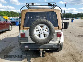 2000 Jeep Wrangler Sahara with VIN 1J4FA59S8YP721771, listed as a Copart auction lot 56924475 with 175,456 mi miles and Clean title. Bid and sale history available at DreamBid. Image 6.