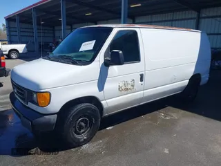 2003 Ford Econoline Cargo with VIN 1FTRE14W03HB60401, listed as a IAAI auction lot 41852847 with 325,883 mi miles. Bid and sale history available at carsss.com. Image 2.