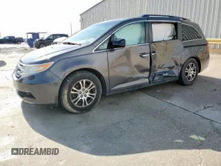2012 Honda Odyssey EX z VIN 5FNRL5H41CB131298, wystawiony jako Copart lot #54515595 z przebiegiem 122 724 mil mil oraz Szkoda całkowita • Salvage title. Historia ofert i sprzedaży dostępna na DreamBid. Obrazek 1.