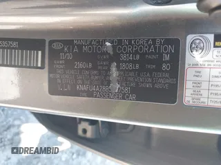 2011 Kia Forte EX with VIN KNAFU4A28B5357581, listed as a IAAI auction lot 41756806 with 296,355 mi miles. Bid and sale history available at carsss.com. Image 9.