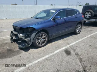 2018 BMW X2 sDrive28i with VIN WBXYJ3C38JEJ82478, listed as a Copart auction lot 61633775 with 52,033 mi miles and Salvage title. Bid and sale history available at DreamBid. Image 1.