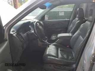 2003 Honda Pilot EX z VIN 2HKYF18593H563871, wystawiony jako Copart lot #55968445 z przebiegiem 213 637 mil mil oraz Szkoda całkowita • Salvage title. Historia ofert i sprzedaży dostępna na DreamBid. Obrazek 7.