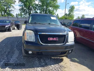 2011 GMC Yukon SLT z VIN 1GKS2CE02BR345370, wystawiony jako IAAI lot #42338653 z przebiegiem 225 000 mil mil oraz . Historia ofert i sprzedaży dostępna na DreamBid. Obrazek 12.