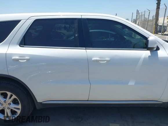 2013 Dodge Durango SXT with VIN 1C4RDHAG9DC678353, listed as a IAAI auction lot 42553988 with 174,042 mi miles and . Bid and sale history available at DreamBid. Image 14.