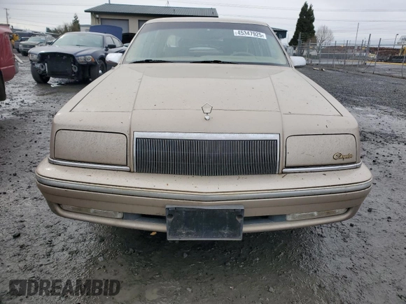 1992 Chrysler New Yorker z VIN 1C3XV66R9ND794543, wystawiony jako Copart lot #45347925 z przebiegiem 46 550 mil mil oraz Czysty tytuł • Clean title. Historia ofert i sprzedaży dostępna na DreamBid. Obrazek 5.