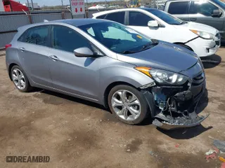 2013 Hyundai Elantra GT with VIN KMHD35LE0DU122770, listed as a IAAI auction lot 41880676 with 142,312 mi miles. Bid and sale history available at carsss.com. Image 1.