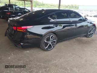 2024 Nissan Altima SR with VIN 1N4BL4CV2RN410920, listed as a IAAI auction lot 42474952 with 23,587 mi miles and . Bid and sale history available at DreamBid. Image 4.