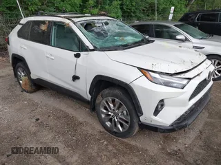 2022 Toyota RAV4 XLE Premium with VIN 2T3A1RFV1NW312419, listed as a IAAI auction lot 42361686 with 14,291 mi miles and . Bid and sale history available at DreamBid. Image 1.