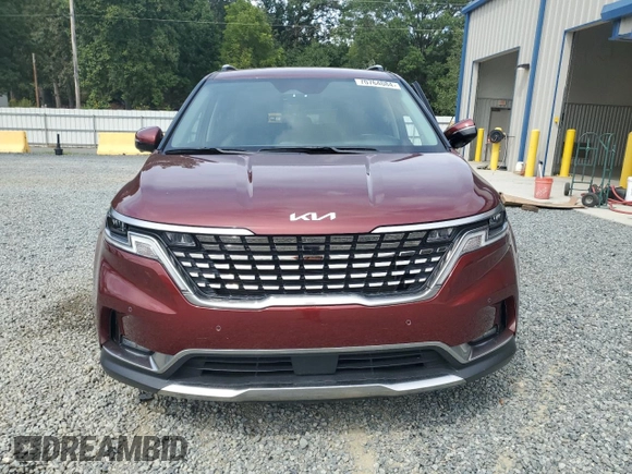 2024 Kia Carnival SX with VIN KNDNE5H37R6305573, listed as a Copart auction lot 70764084 with 23,492 mi miles and Salvage Title. Bid and sale history available at DreamBid. Image 5.