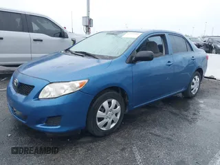 2009 Toyota Corolla with VIN JTDBL40E999052447, listed as a IAAI auction lot 41914900 with 133,676 mi miles. Bid and sale history available at carsss.com. Image 2.