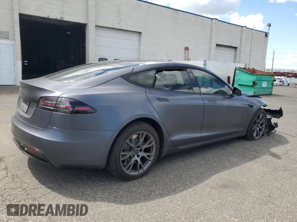 2022 Tesla Model S с VIN 5YJSA1E5XNF488415, выставлен на аукционе Copart как лот 57347565 с пробегом 18 662 миль миль и Списание • Salvage title. История ставок и продаж доступна на DreamBid. Изображение 3.