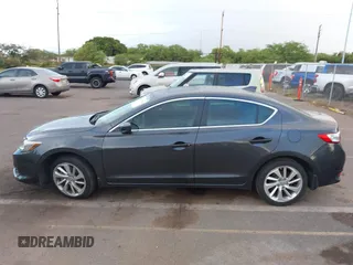 2016 Acura ILX with VIN 19UDE2F38GA021524, listed as a IAAI auction lot 41723974 with 82,415 mi miles and . Bid and sale history available at DreamBid. Image 14.