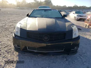 2009 Cadillac XLR Platinum z VIN 1G6YV36A395600052, wystawiony jako Copart lot #76961534 z przebiegiem 176 354 mil mil oraz Szkody całkowita. Historia ofert i sprzedaży dostępna na DreamBid. Obrazek 5.