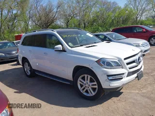 2014 Mercedes-Benz GL 450 z VIN 4JGDF7CE0EA393429, wystawiony jako IAAI lot #39115126 z przebiegiem 100 795 mil mil oraz . Historia ofert i sprzedaży dostępna na DreamBid. Obrazek 1.