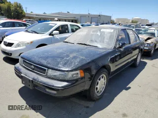 1993 Nissan Maxima z VIN JN1HJ01F6PT114020, wystawiony jako Copart lot #61137914 z przebiegiem 230 999 mil mil oraz Tytuł czysty. Historia ofert i sprzedaży dostępna na DreamBid. Obrazek 1.