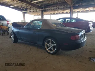 2003 Mazda MX-5 Miata Cloth with VIN JM1NB353730303334, listed as a Copart auction lot 51692615 with 142,789 mi miles and Salvage title. Bid and sale history available at DreamBid. Image 2.
