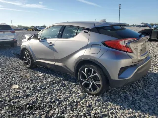 2019 Toyota C-HR XLE z VIN NMTKHMBX6KR070507, wystawiony jako Copart lot #50090175 z przebiegiem 109 471 mil mil oraz Szkody całkowita. Historia ofert i sprzedaży dostępna na DreamBid. Obrazek 2.