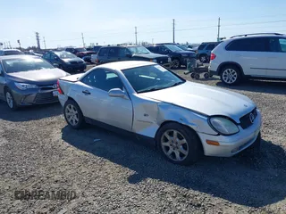 1998 Mercedes-Benz SLK-Class with VIN WDBKK47F0WF007183, listed as a IAAI auction lot 41761143 with 164,881 mi miles. Bid and sale history available at carsss.com. Image 1.