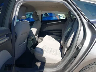 2016 Ford Fusion S with VIN 3FA6P0G70GR245860, listed as a IAAI auction lot 41208849 with 123,565 mi miles. Bid and sale history available at carsss.com. Image 8.