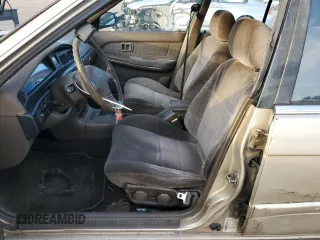 1990 Nissan Stanza GXE z VIN JN1FU21P9LX822087, wystawiony jako Copart lot #82967984 z przebiegiem 109 985 mil mil oraz Tytuł czysty. Historia ofert i sprzedaży dostępna na DreamBid. Obrazek 7.