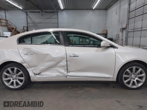 2012 Buick LaCrosse Touring with VIN 1G4GJ5E30CF372091, listed as a IAAI auction lot 41251119 with 45,004 mi miles and . Bid and sale history available at DreamBid. Image 13.