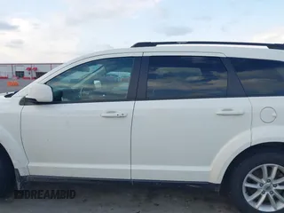 2018 Dodge Journey SXT with VIN 3C4PDCBG4JT369687, listed as a IAAI auction lot 42269696 with 131,306 mi miles and . Bid and sale history available at DreamBid. Image 13.