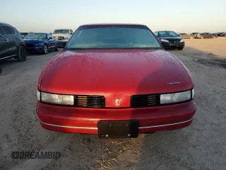 1989 Oldsmobile Cutlass z VIN 1G3WH14W0KD355432, wystawiony jako Copart lot #78787204 z przebiegiem Nie podano mil oraz Szkody całkowita. Historia ofert i sprzedaży dostępna na DreamBid. Obrazek 5.