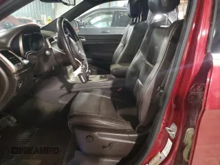 2015 Jeep Grand Cherokee Summit with VIN 1C4RJFJG2FC664245, listed as a Copart auction lot 54131515 with 141,605 mi miles and Salvage Title. Bid and sale history available at DreamBid. Image 7.